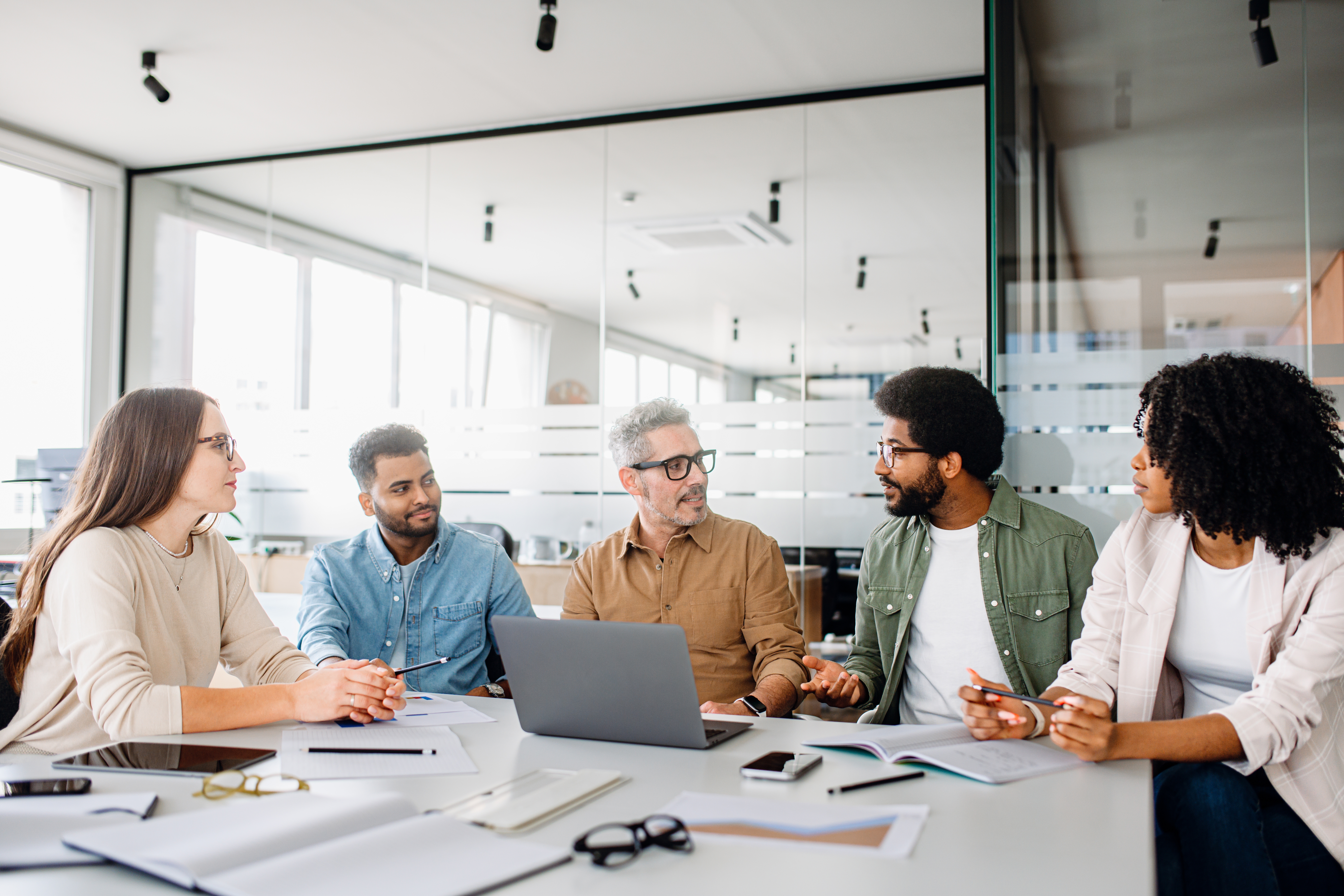 diverse team encouraging the culture of mentorship